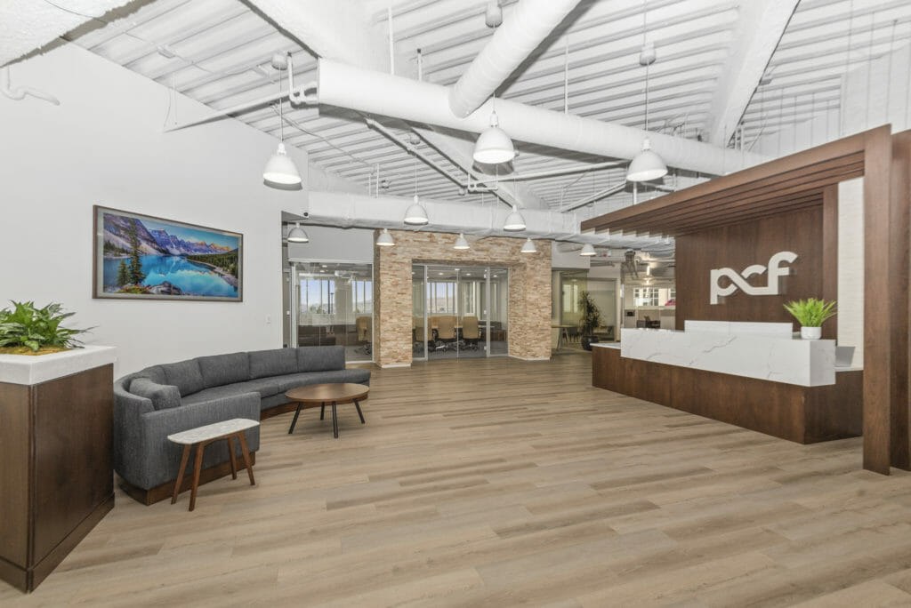 PCF main lobby with front desk and couch | Utah Commercial Real Estate