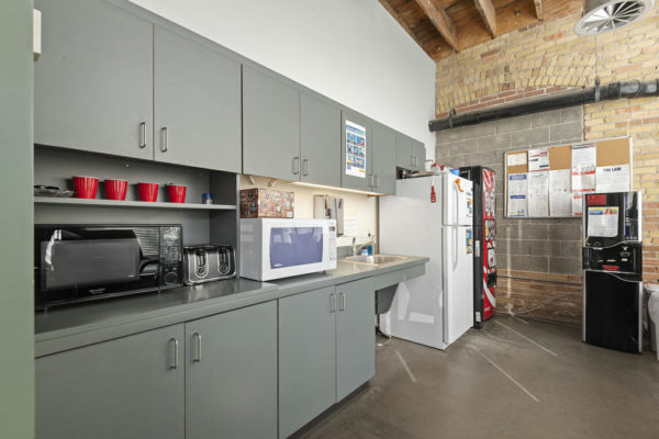 break room with fridge and microwave