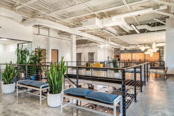 Benches in commercial office space next to stairs