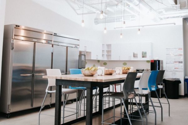 Kitchen area with large commercial refrigerators