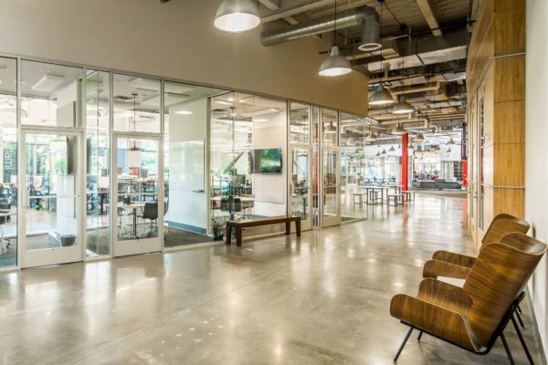 Sitting area outside individual meeting rooms in Qualtrics office